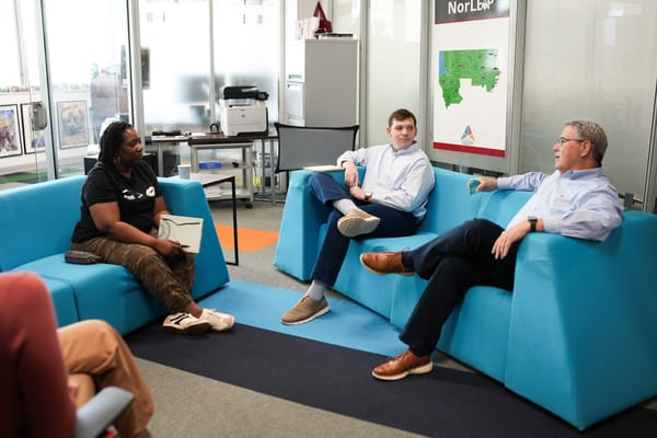 Entrepreneurs in casual office meeting