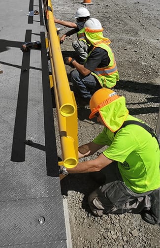 Michelli installation team performing scale and equipment setup
