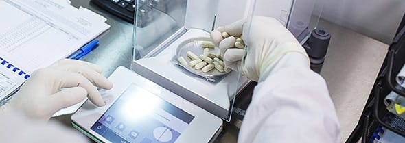 Laboratory balance in use for precision measurement