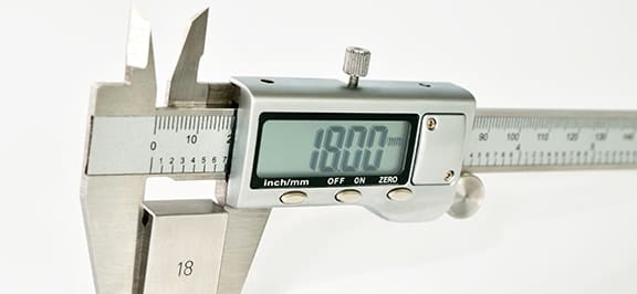 Physical dimensional calibration of caliper in progress