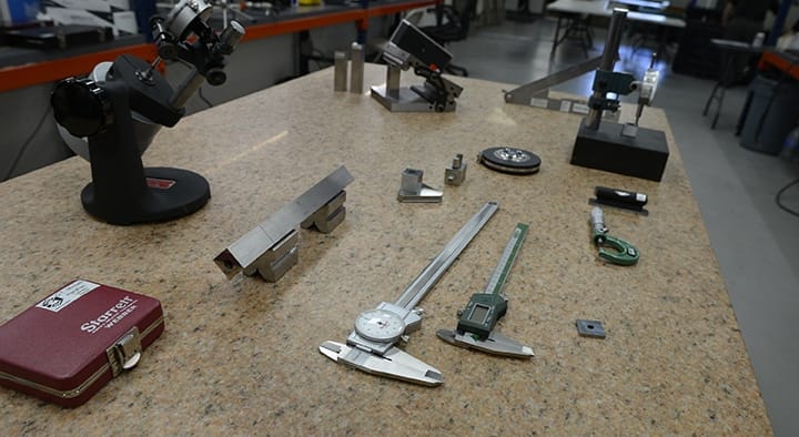 Michelli physical dimensional calibration laboratory with calipers, micrometers, and gauge blocks