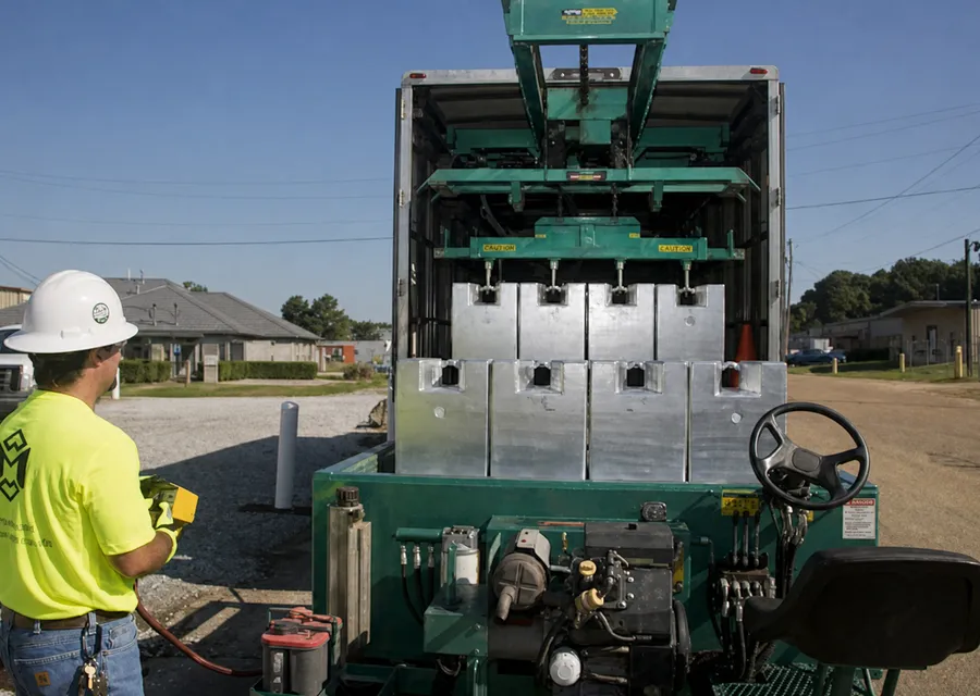 Industrial technician repairing and installing large scale equipment