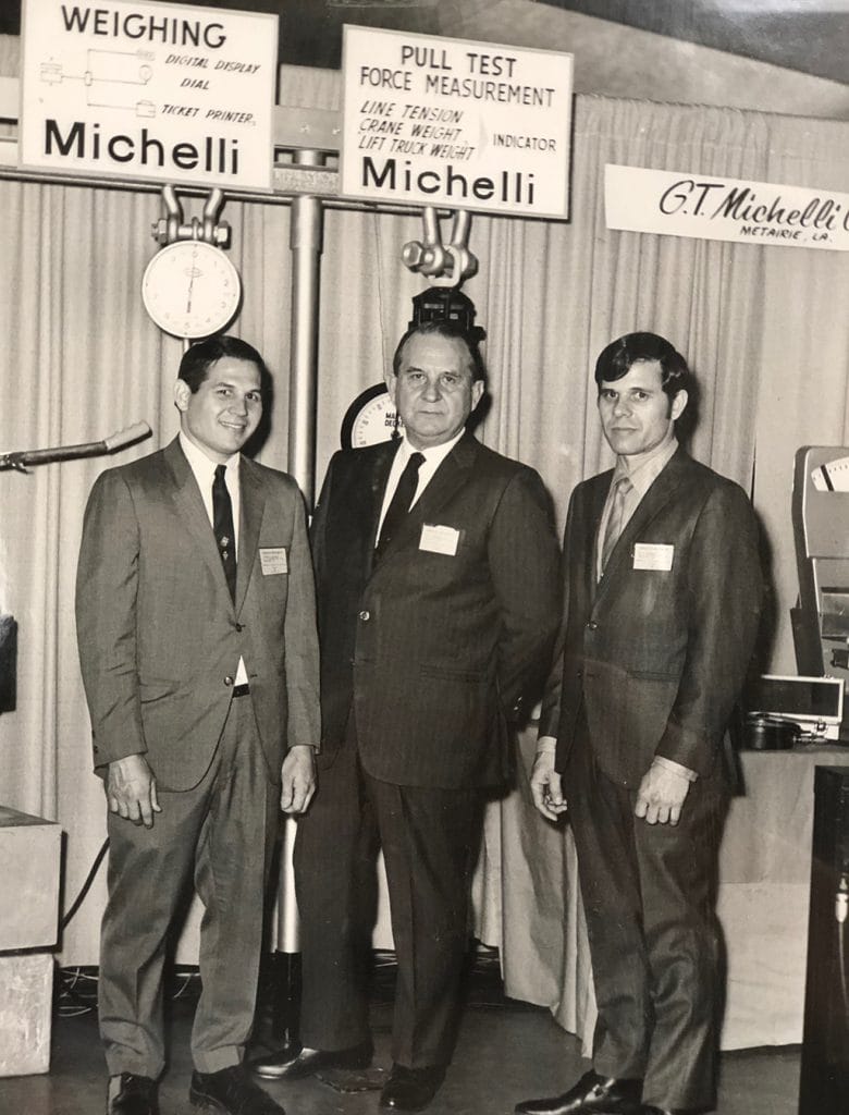 G.T. Michelli Company representatives at their booth at the Workboat Show in New Orleans circa 1965