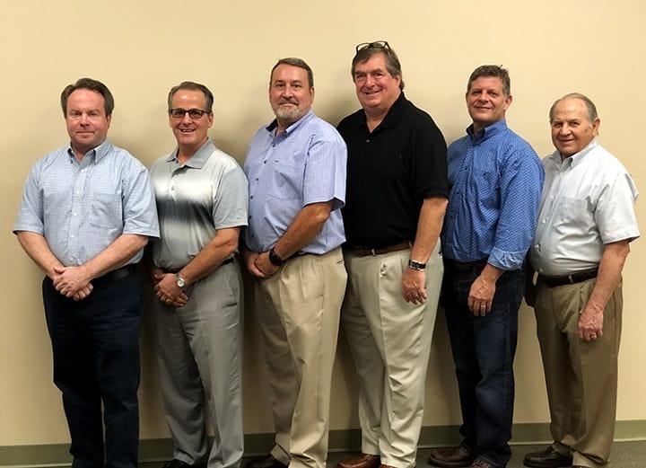 Michelli Weighing & Measurement ownership team gathered at the Harahan headquarters in 2017 following the Southern Scales & Controls acquisition