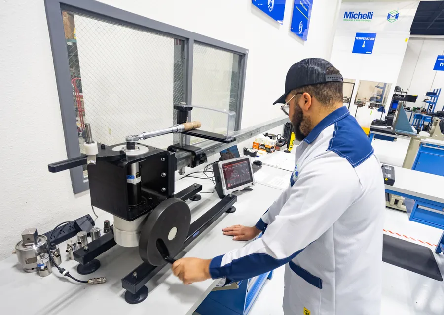 Michelli technician performing precision calibration service