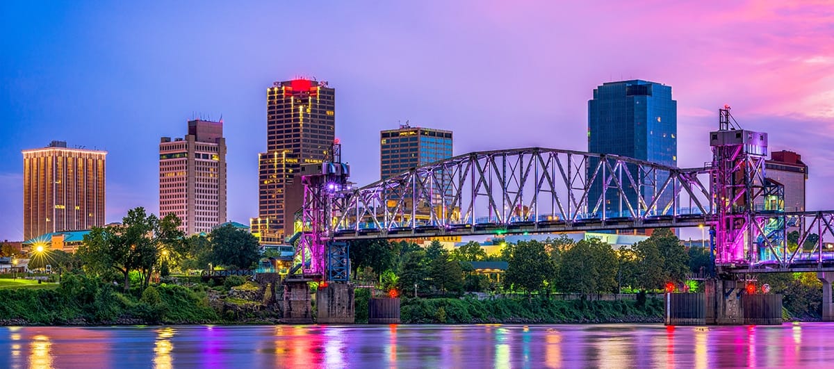 Little Rock Arkansas skyline viewed from across the Arkansas River at dusk