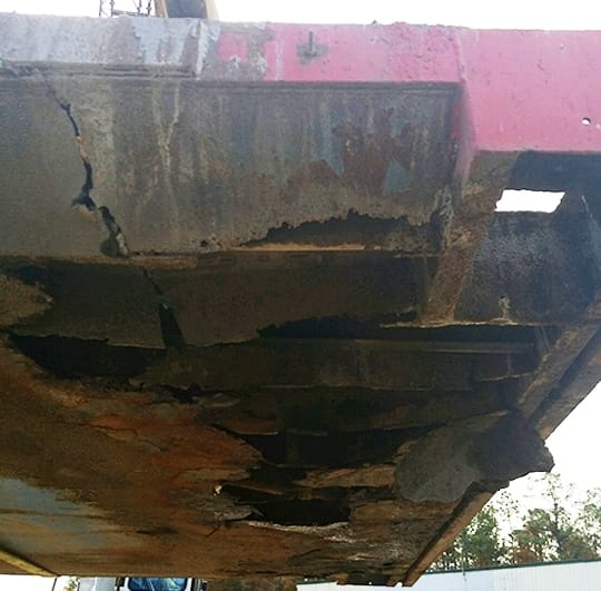 The bottom of this truck scale has rusted through completely
