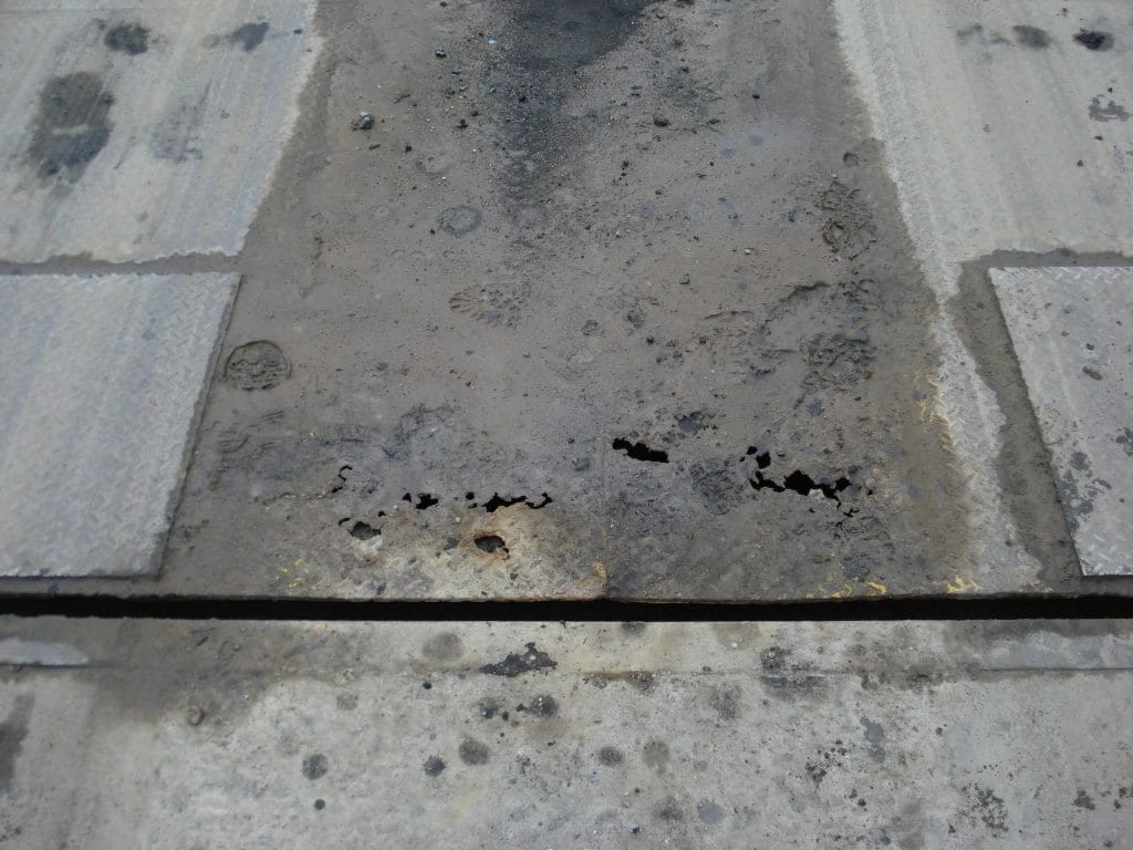 Moisture in mud and other debris can cause a deckplate to prematurely rust