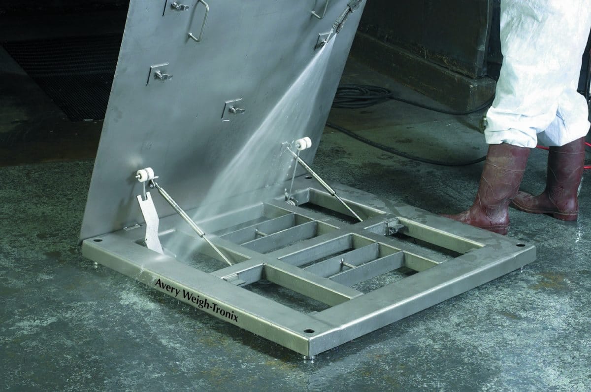 Avery Weigh-Tronix FCQH hinge top floor scale with top plate raised for cleaning