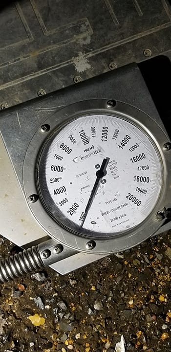 A wheel weigher or wheel load weigher portable vehicle scale