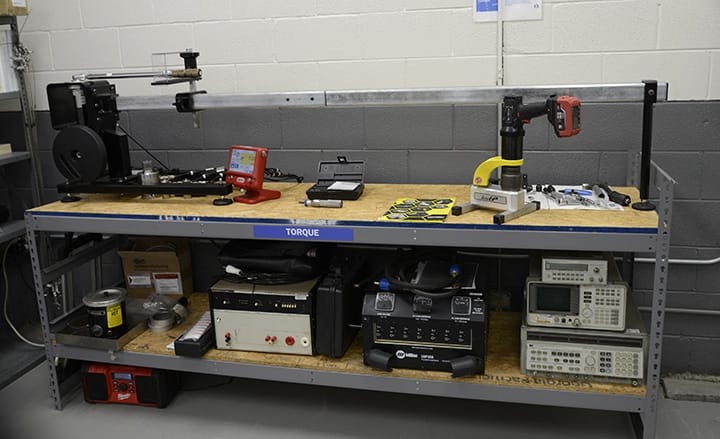 Torque and bolting tool calibration bench inside Michelli Weighing & Measurement calibration laboratory