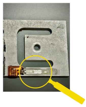 Strain gauge — a precision sensor used to measure strain on an object, critical component in load cells