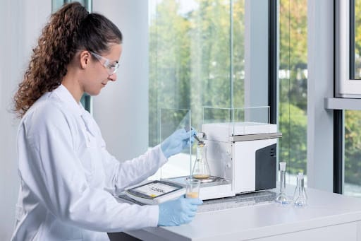 A pharmaceutical quality control laboratory environment with precision measurement equipment