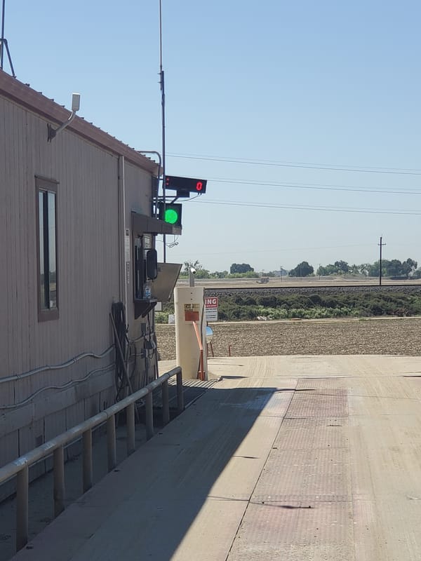 Weigh station with green light indicator for aggregates mining and bulk materials truck scale