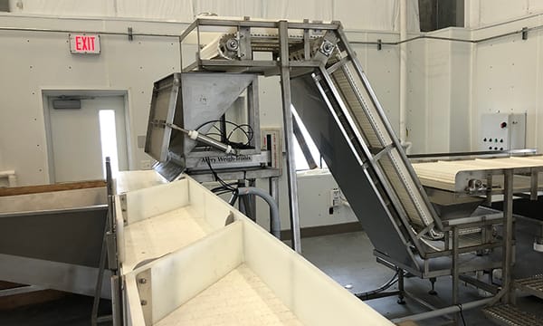 Industrial conveyor system in a factory setting