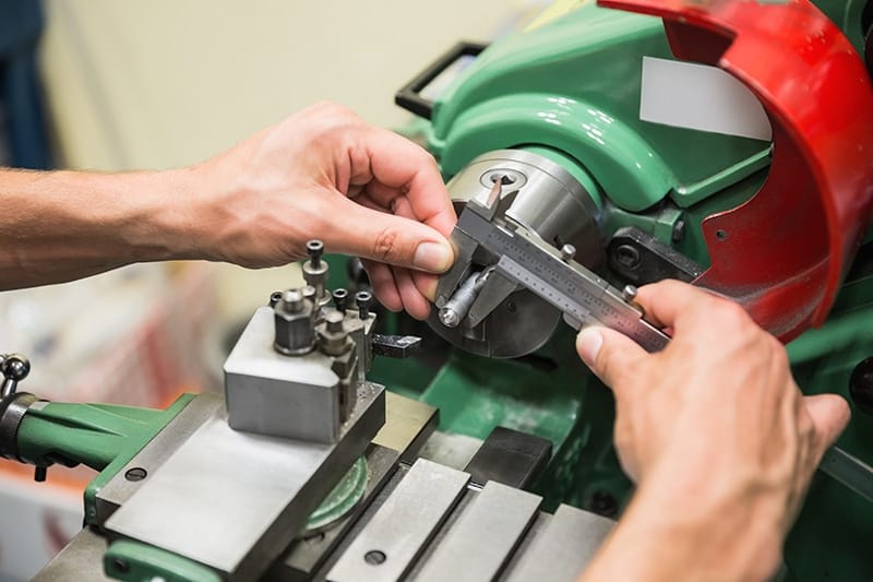 Michelli Weighing & Measurement technician servicing manufacturing floor scale and production weighing equipment