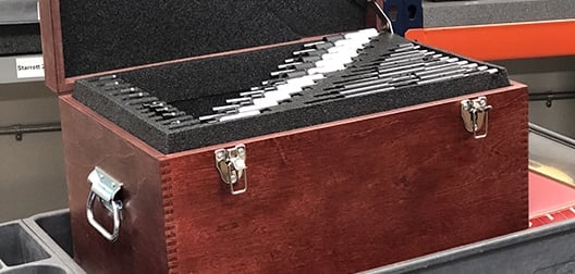 Dimensional tools in wooden storage case