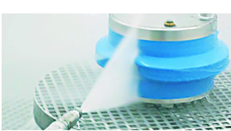 Pressurized water sprayed at equipment covered by protective sleeve due to hygienic scale design
