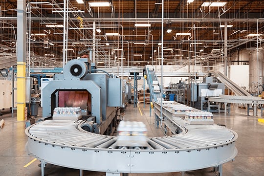 Conveyor belt as part of a Quality control weighing system in a bottling plant