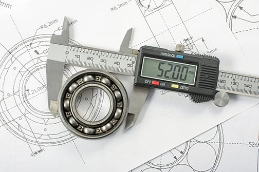 Precision measurement instruments including calipers and gauges used for aerospace component inspection and calibration