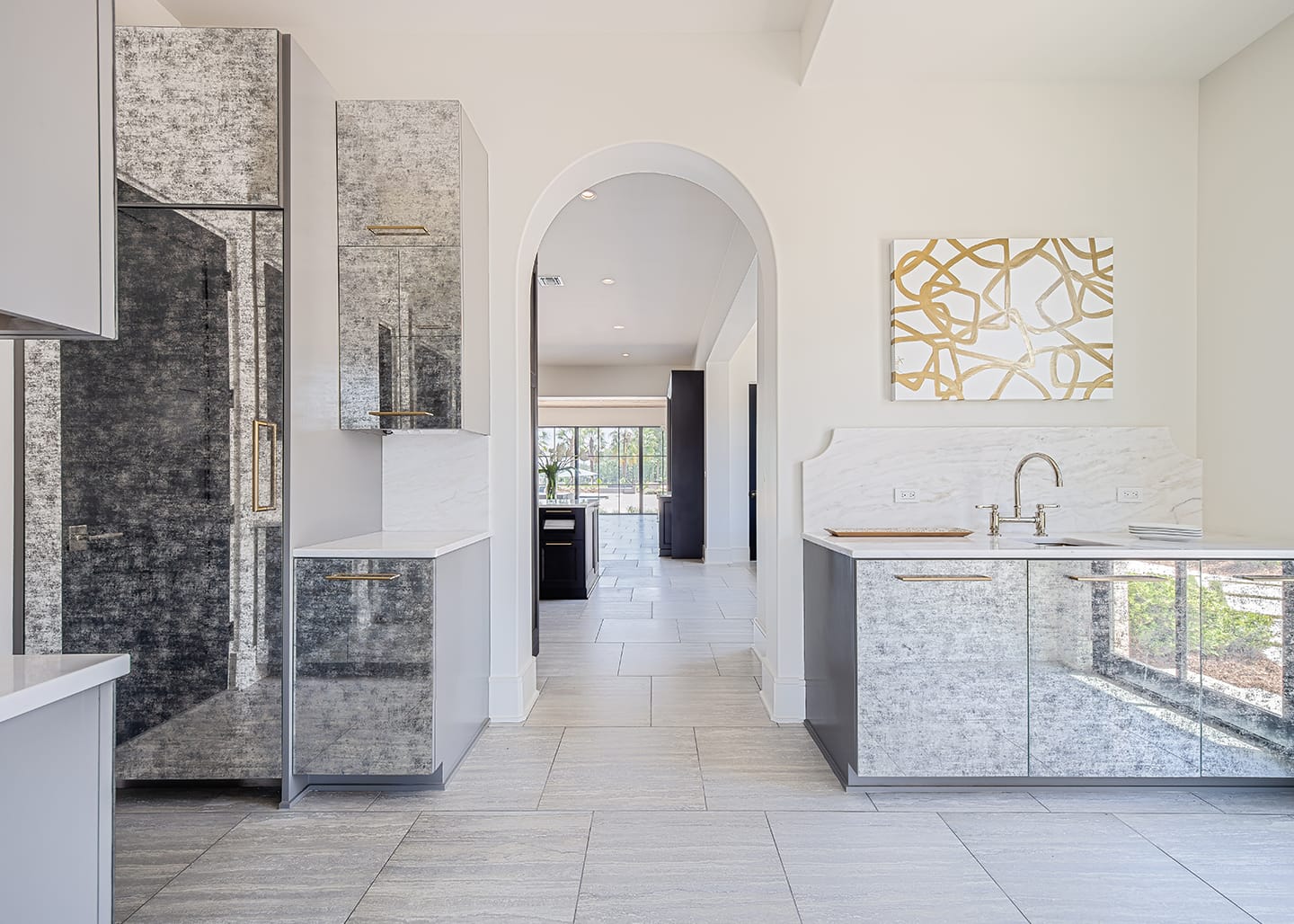 Butler pantry with eglomise mirror cabinetry