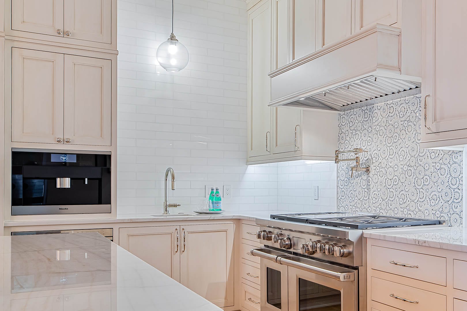 Kitchen with custom cabinetry and luxury appliances