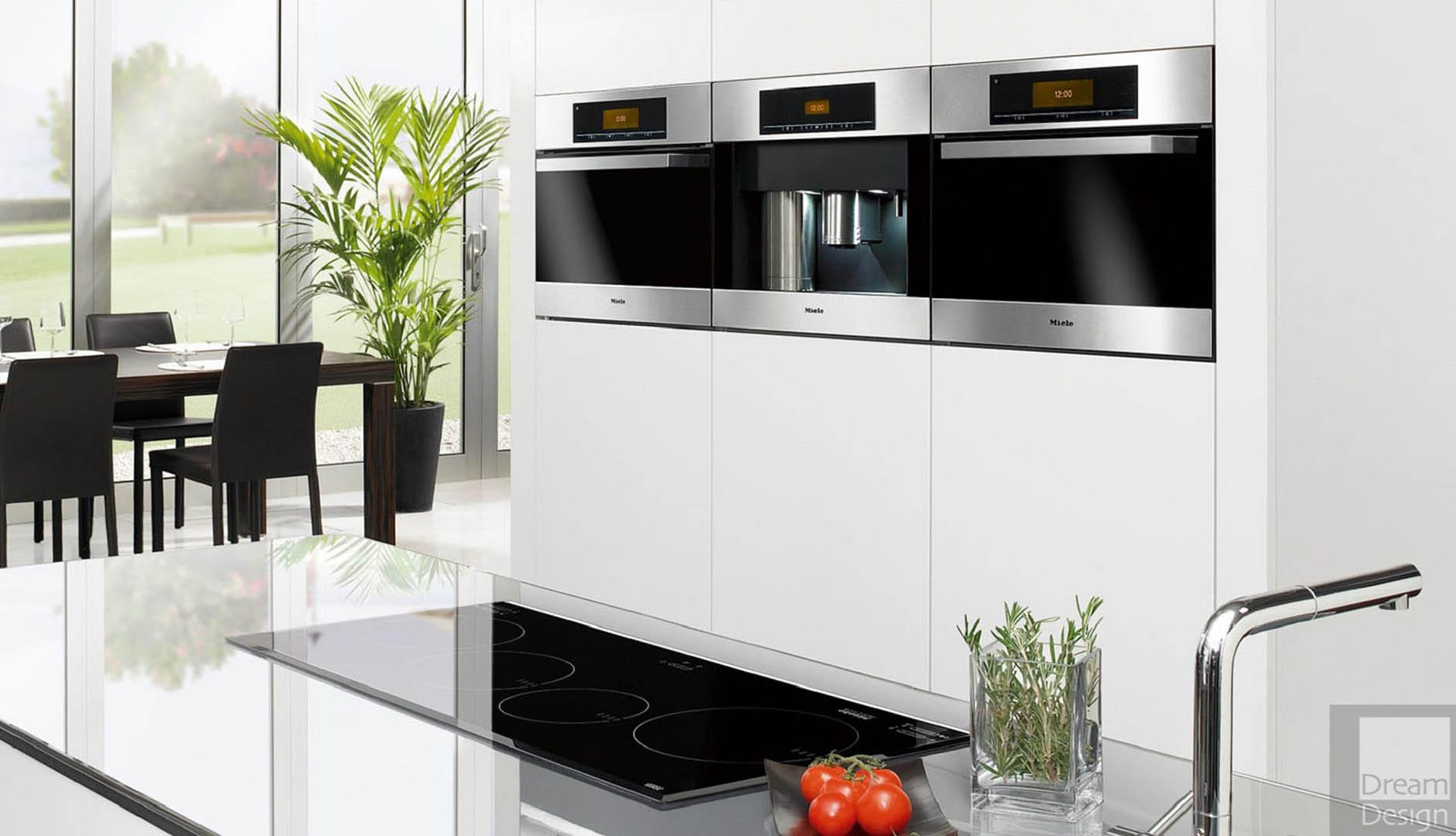 Showroom kitchen featuring top appliance brands