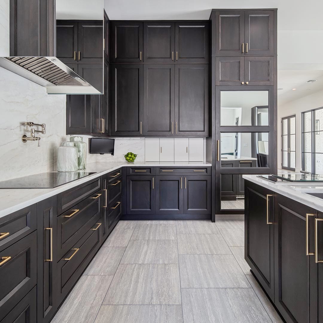 Open-plan gourmet kitchen by The Cottage Shreveport