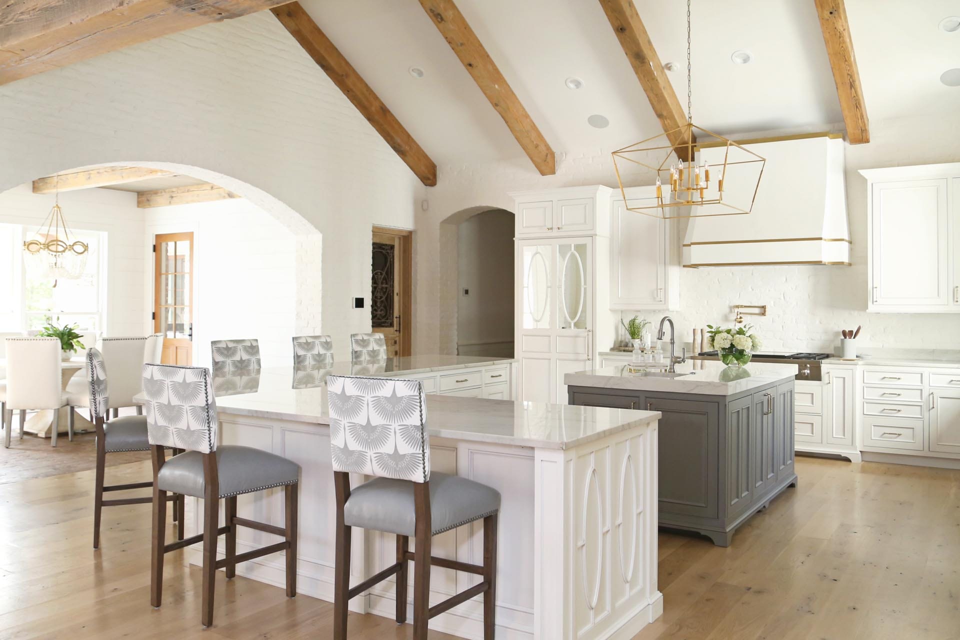 Custom gourmet kitchen with premium cabinetry by The Cottage