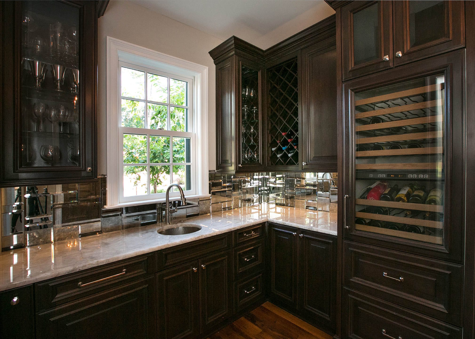 Elston kitchen remodel by The Cottage featuring custom cabinetry and luxury finishes
