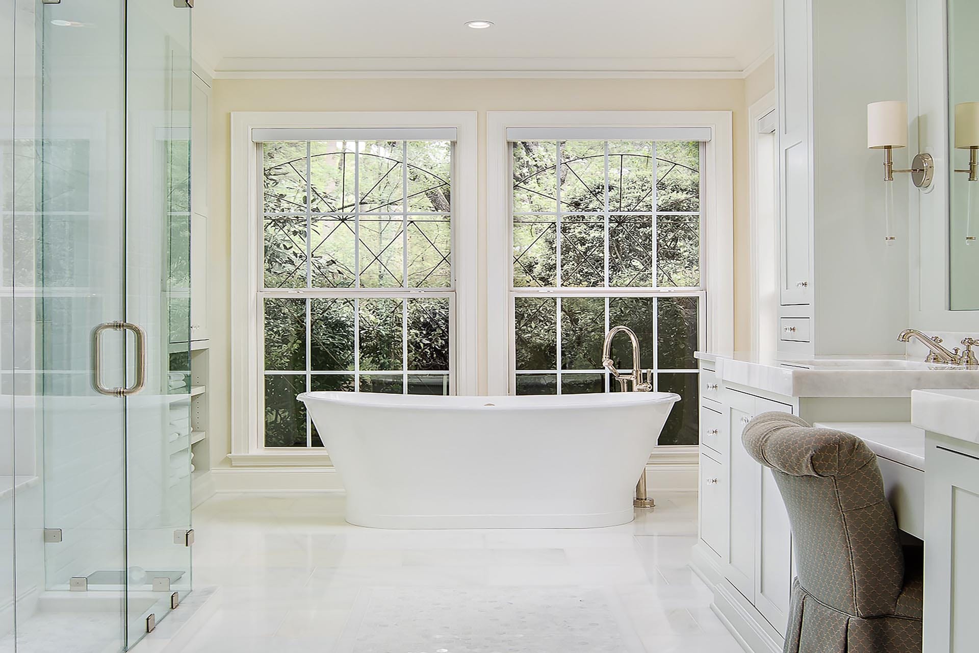 Custom vanity and marble countertop bathroom by The Cottage