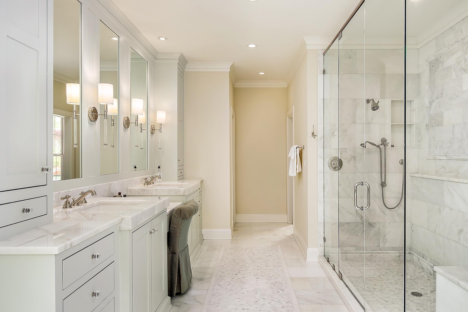 Luxury bathroom with walk-in shower design by The Cottage