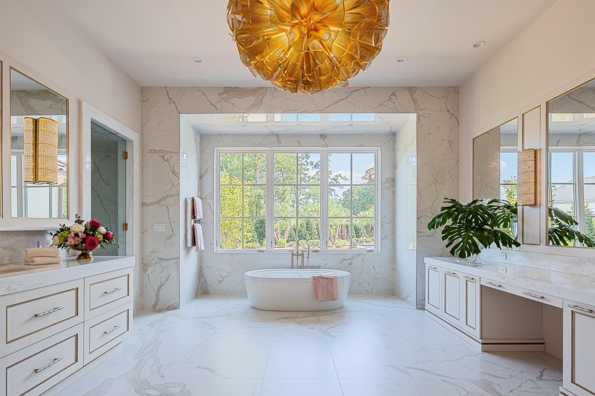 High-end bathroom remodel with premium fixtures by The Cottage