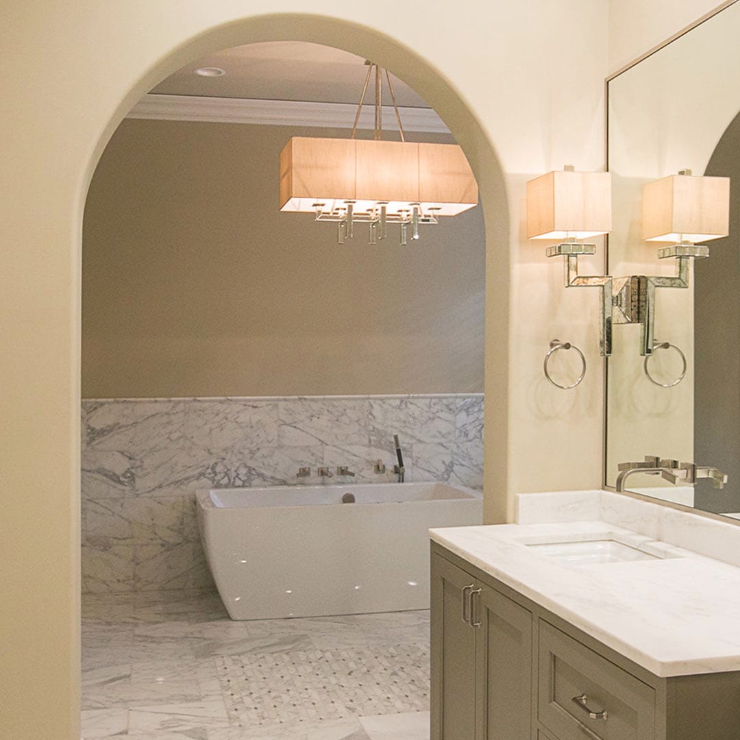High-end bathroom design with custom shower by The Cottage