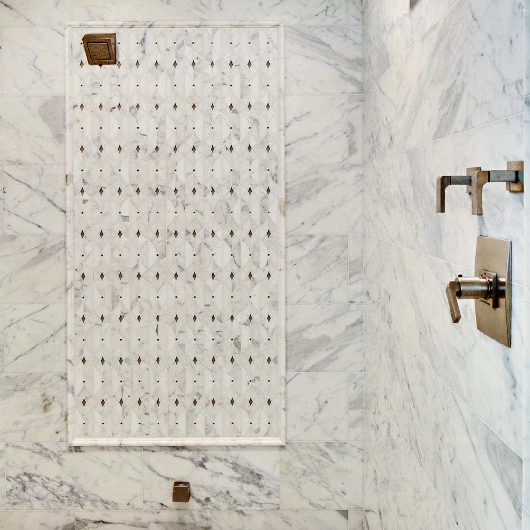 Spa-quality bathroom design with custom tile by The Cottage