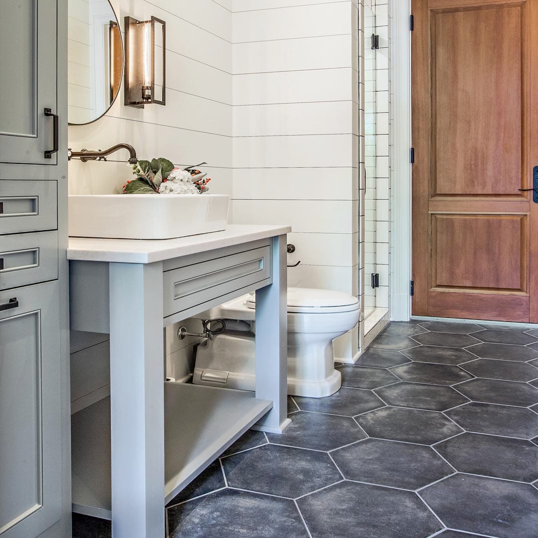Custom master bathroom with freestanding tub by The Cottage