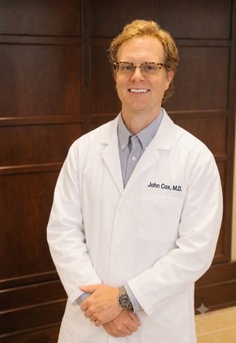 Portrait of Dr. John Cox, family physician at The Family Doctors