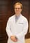 Portrait of Dr. John Cox, family physician at The Family Doctors